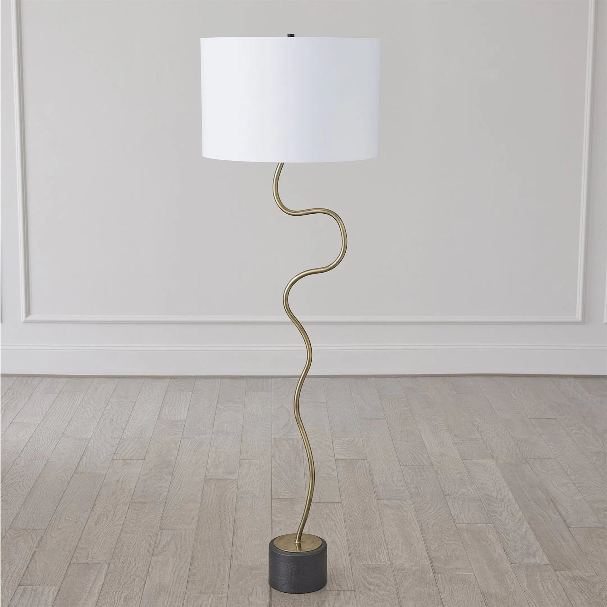 Loop Floor Lamp by Global Views in black, white, off-white, tan and brass. Made from unique in a unique style.