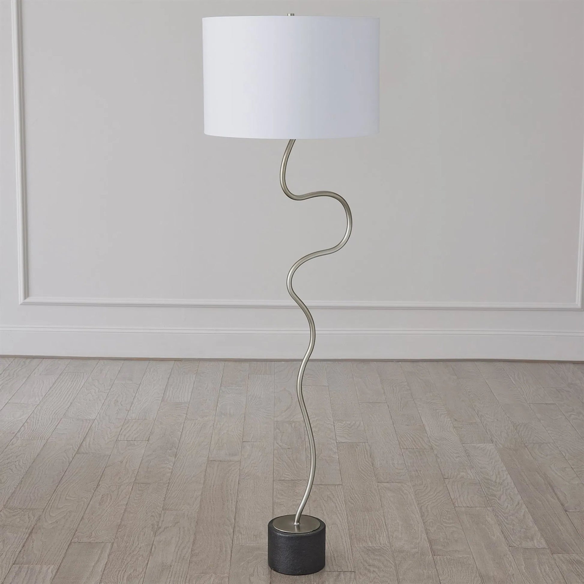 Loop Floor Lamp by Global Views in black, white, off-white, tan and brass. Made from unique in a unique style.