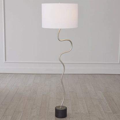 Loop Floor Lamp by Global Views in black, white, off-white, tan and brass. Made from unique in a unique style.