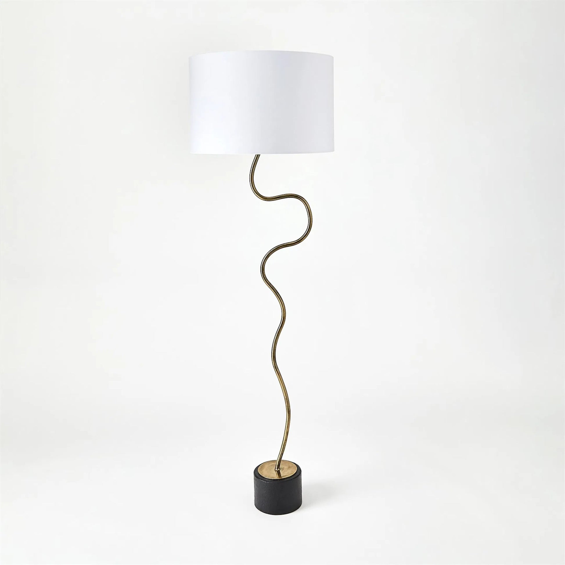 Loop Floor Lamp by Global Views in black, white, off-white, tan and brass. Made from unique in a unique style.