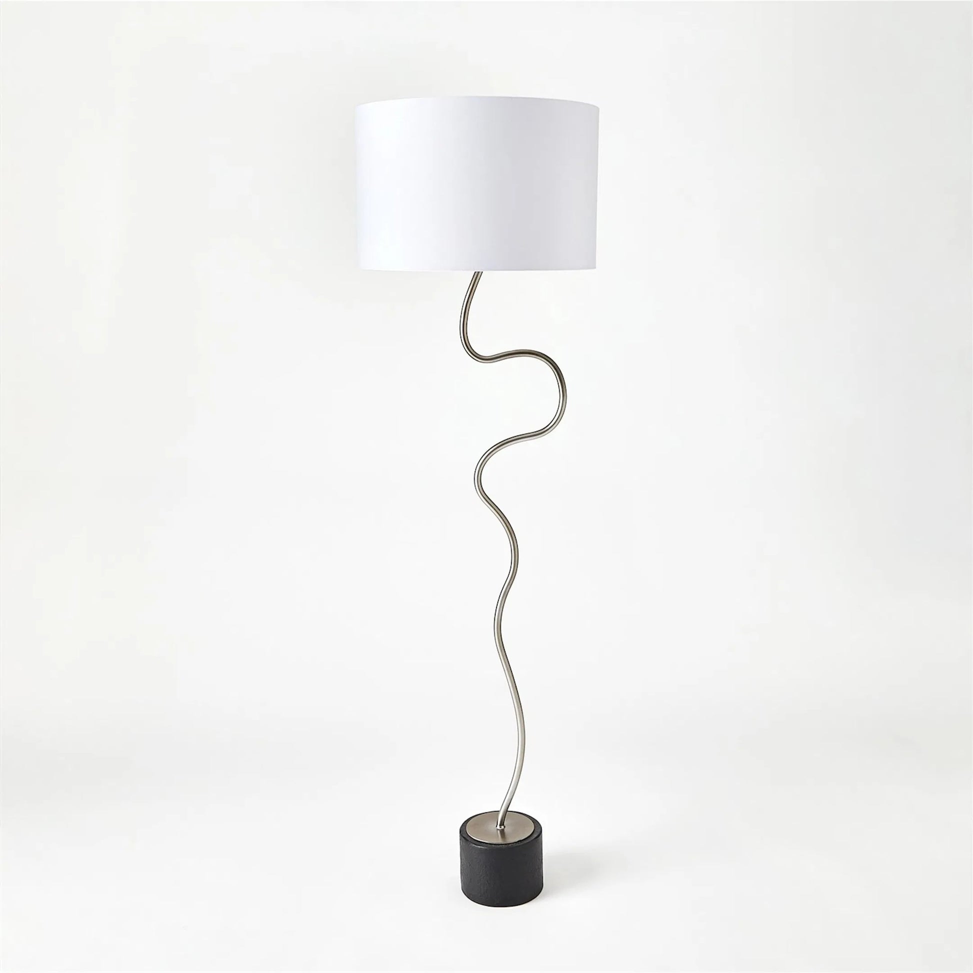 Loop Floor Lamp by Global Views in black, white, off-white, tan and brass. Made from unique in a unique style.