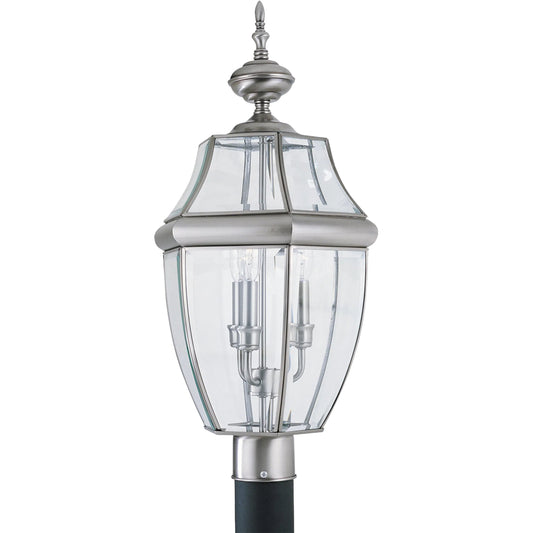 Lancaster Three Light Outdoor Post Lantern by Visual Comfort & Co.. Made from brass in a unique style.