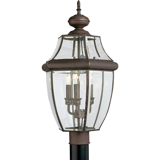Lancaster Three Light Outdoor Post Lantern by Visual Comfort & Co.. Made from brass in a unique style.