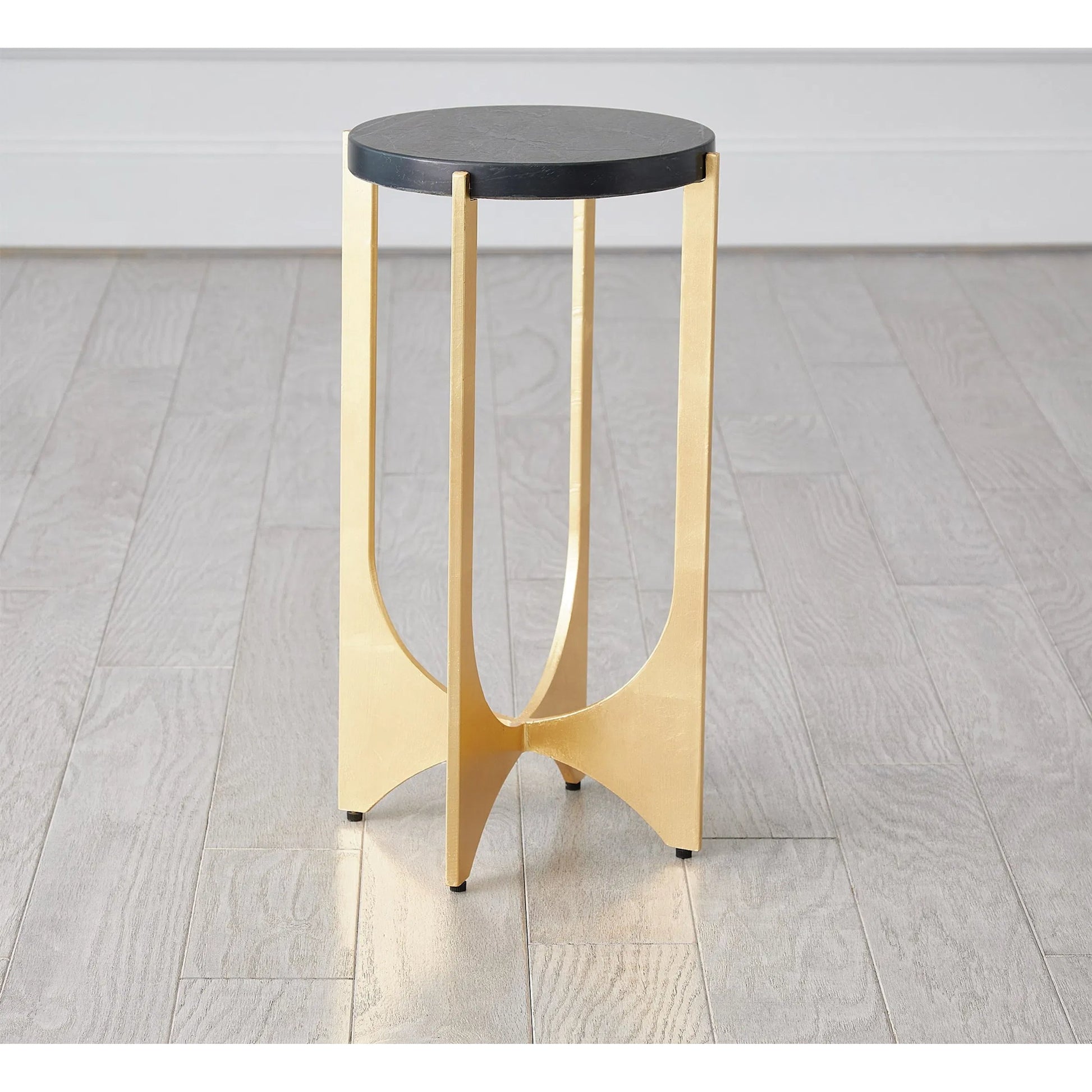 Tempest Table by Global Views in gold leaf. Made from iron, black marin leather marble in a unique style.