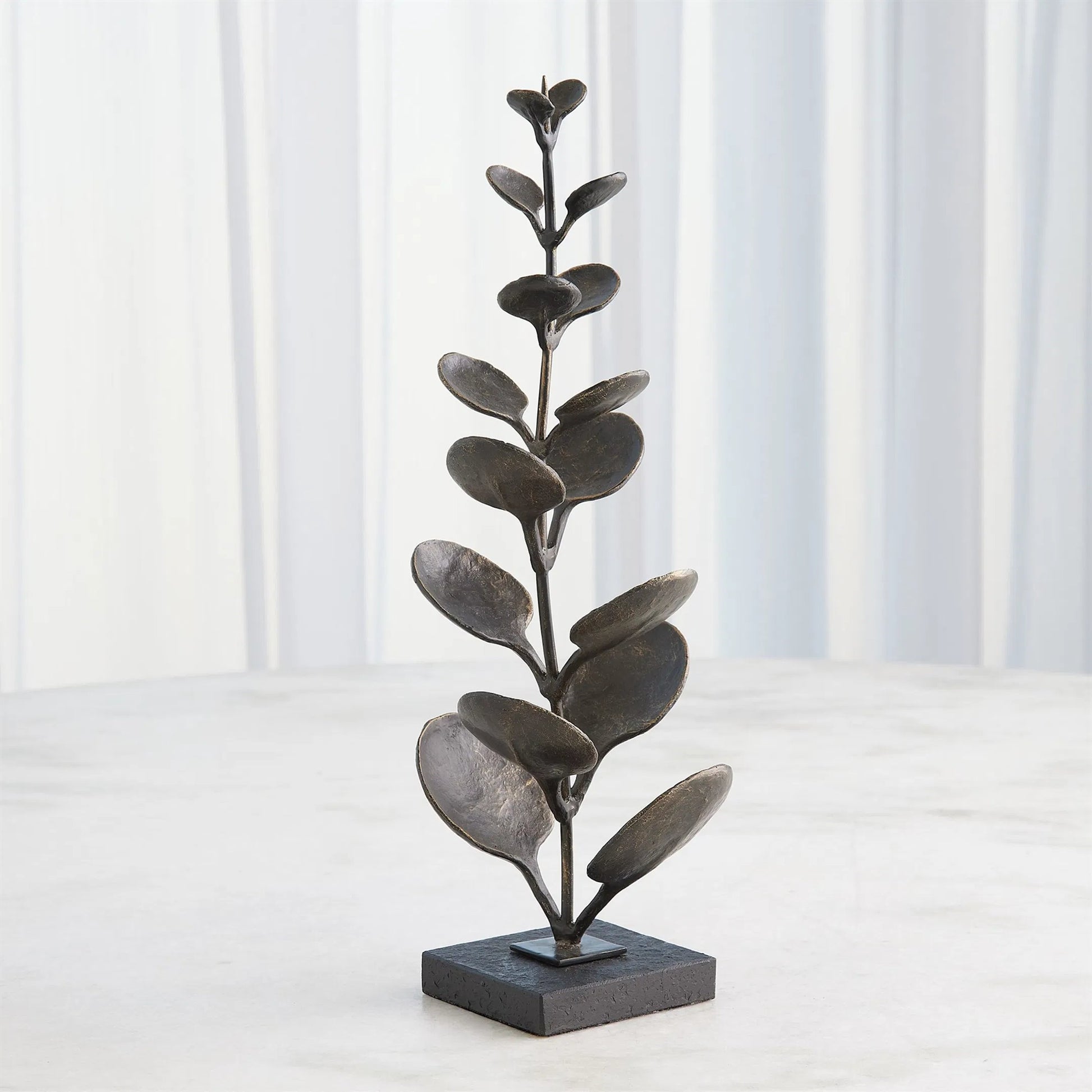 Liana Sculpture by Global Views in bronze. Made from cast iron, iron, marble in a unique style.