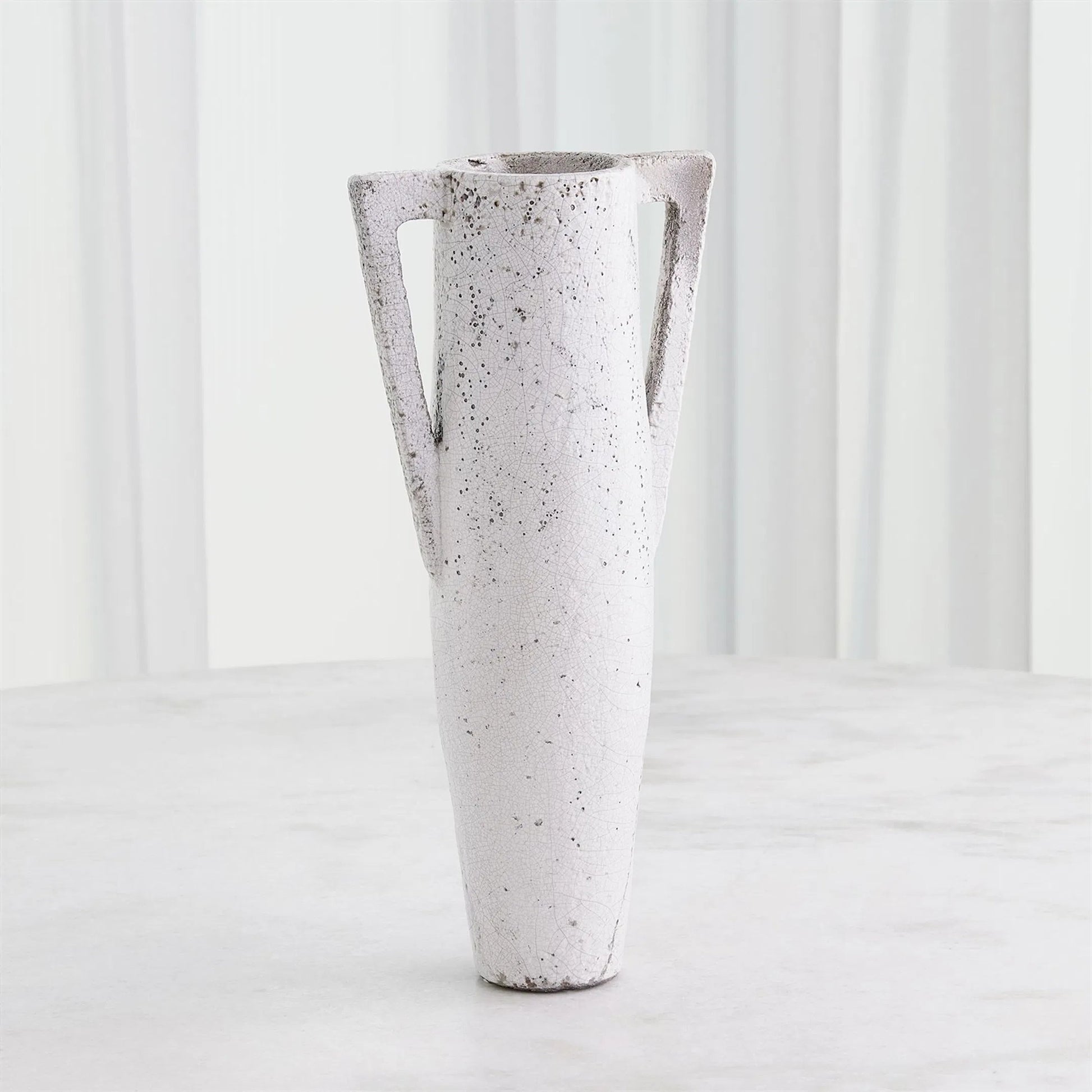 Diaphony Vase by Global Views. Made from ceramic-raku in a modern style.
