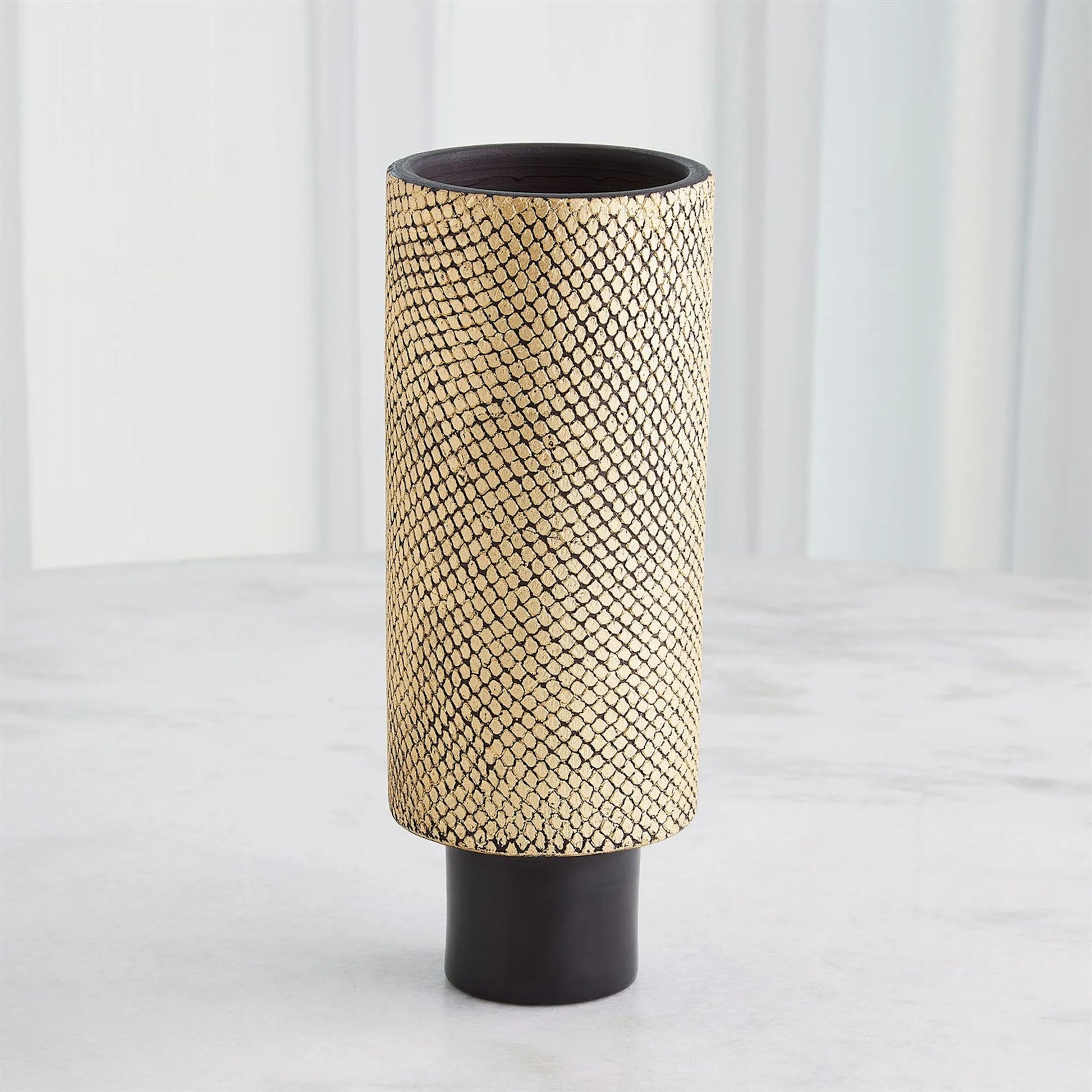 Java Footed Vase by Global Views in matte black and gold. Made from unique in a modern style.