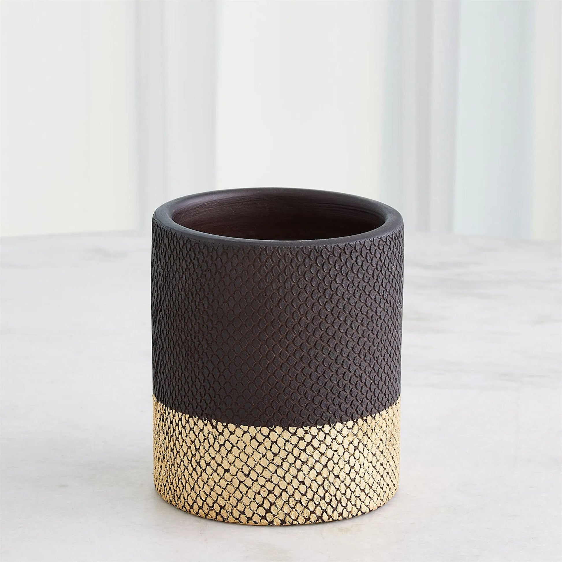 Java Footed Vase by Global Views in matte black and gold. Made from unique in a modern style.