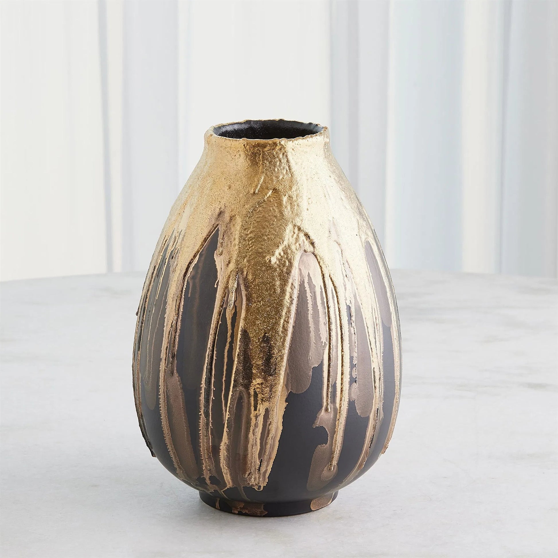 Cauldron Vase by Global Views in gold. Made from ceramic in a modern style.