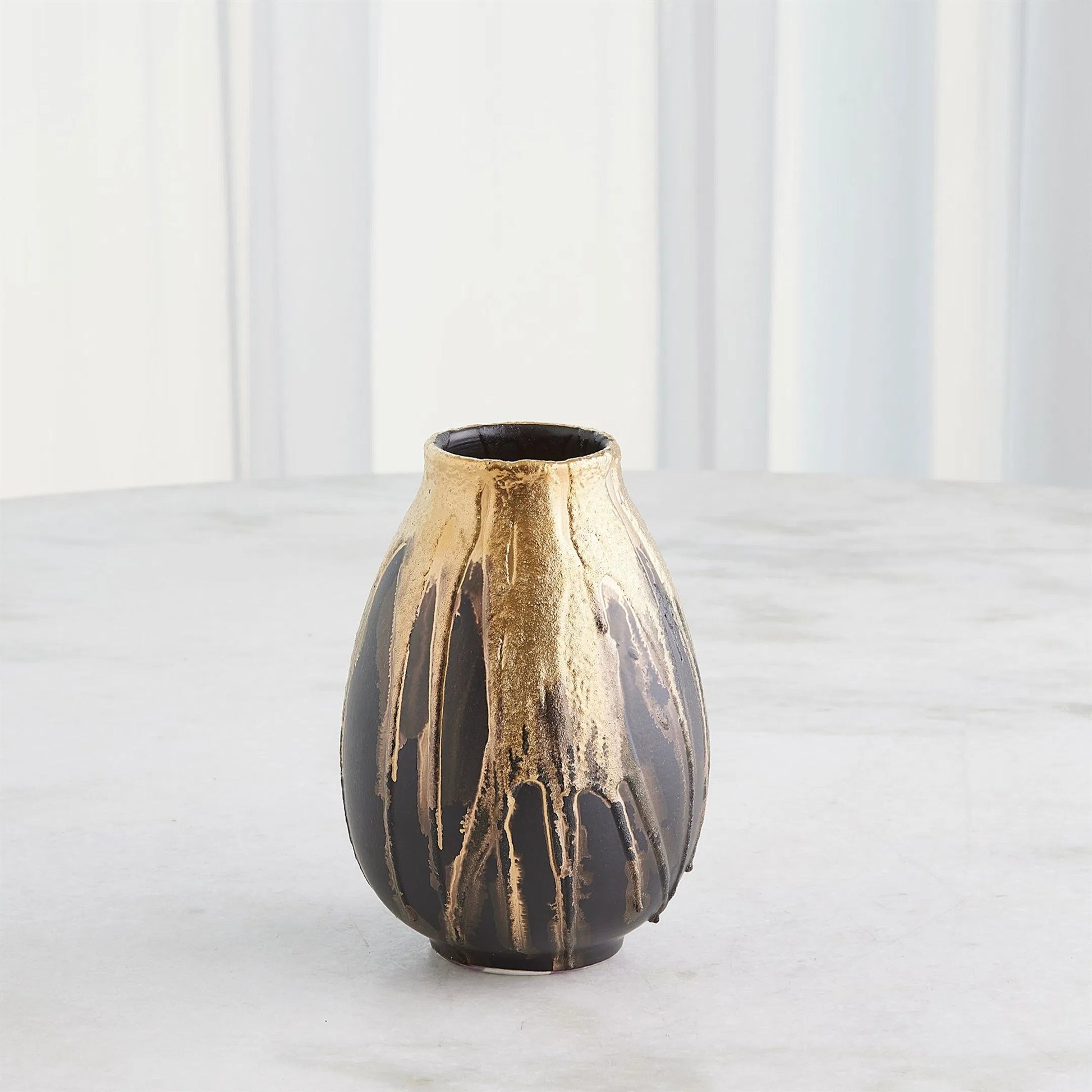 Cauldron Vase by Global Views in gold. Made from ceramic in a modern style.