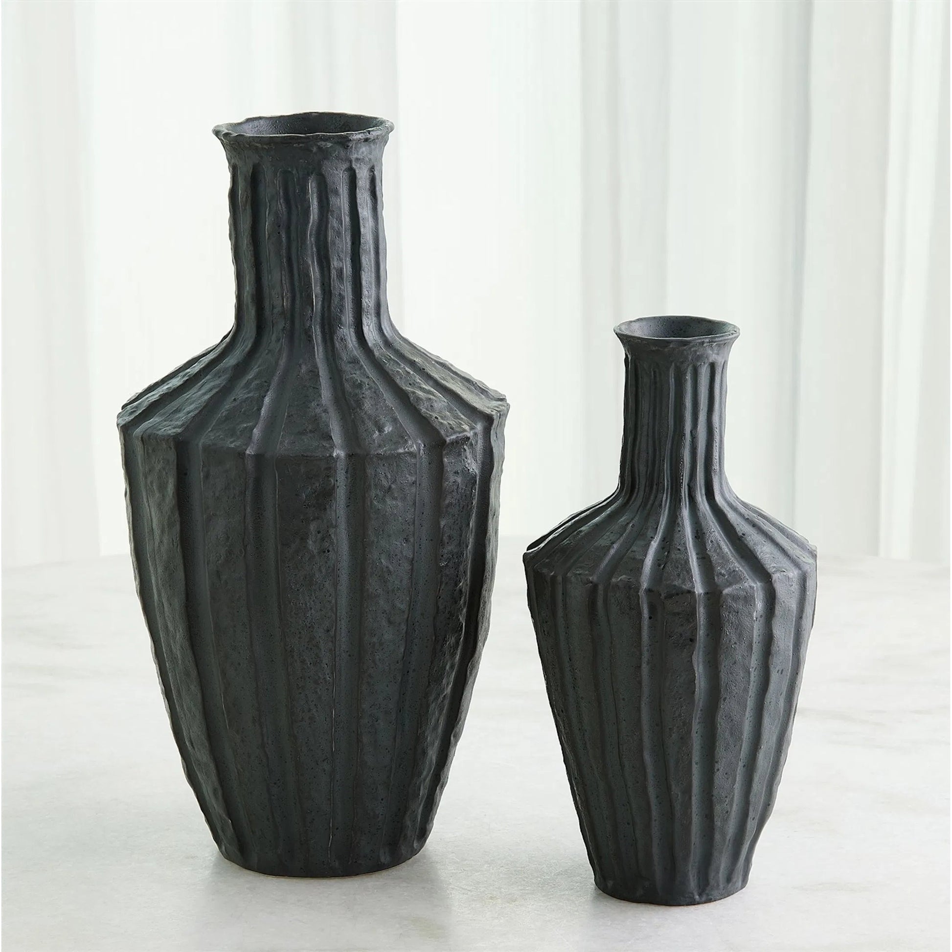 Emperor Vase by Global Views in black. Made from unique in a unique style.