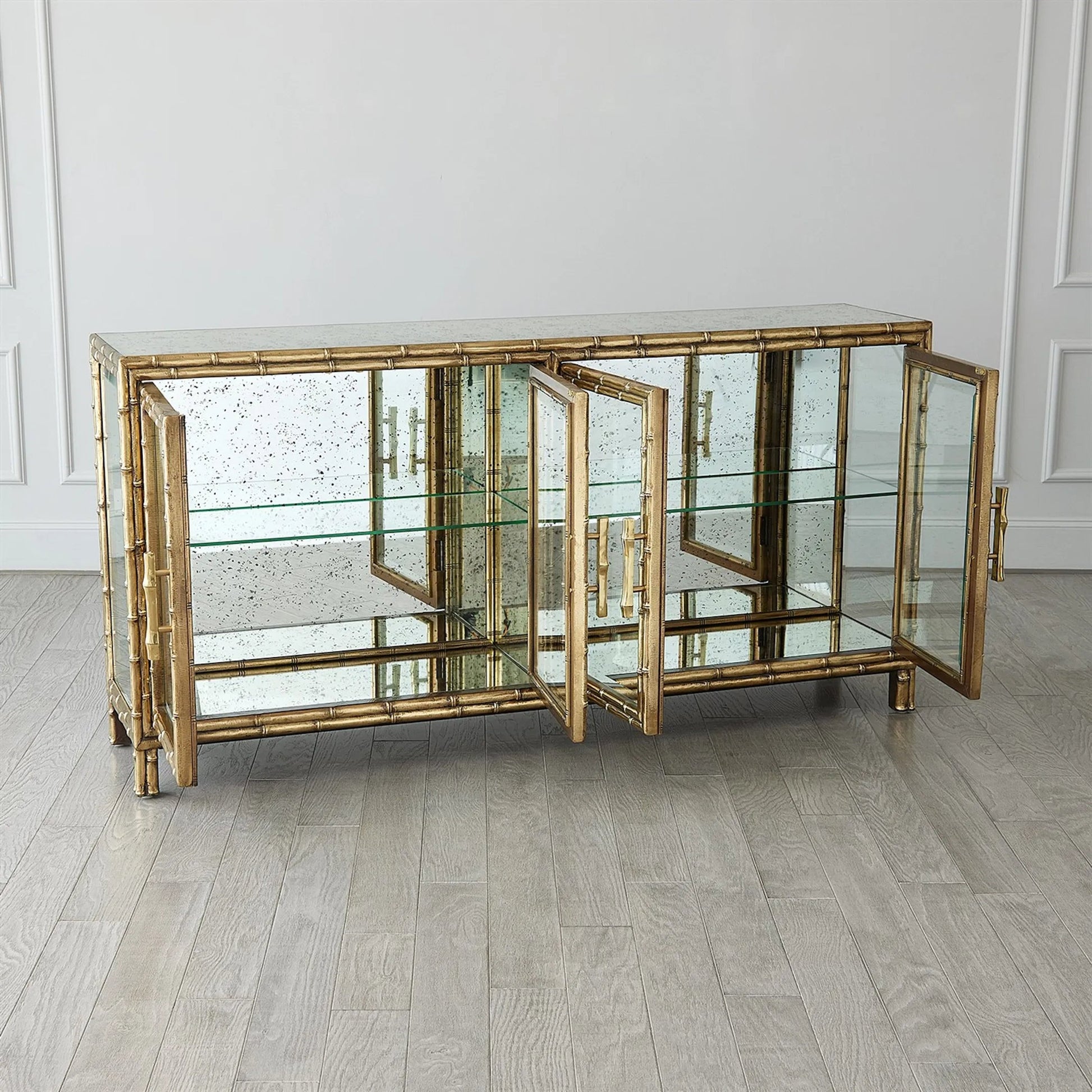 Bamboo Console by Global Views in brass. Made from unique in a rustic style.