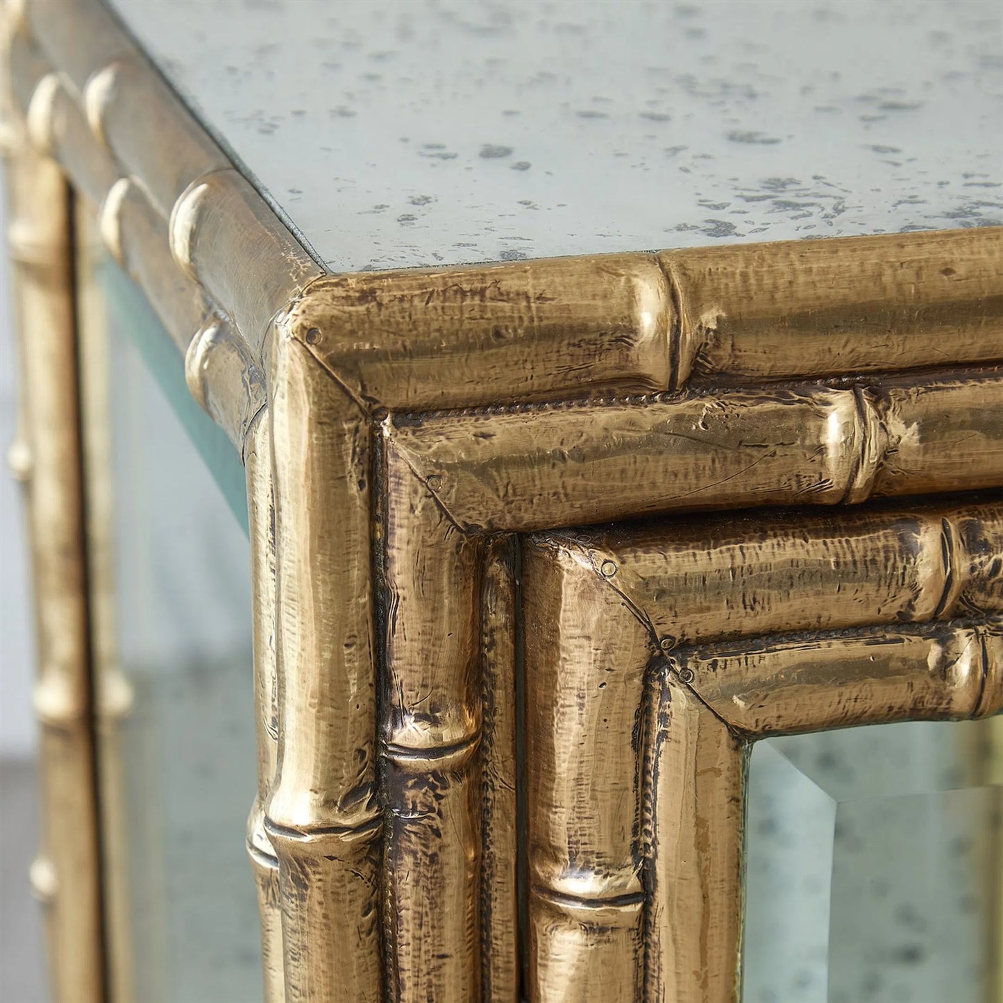 006 SI-2323116 | Closeup | Bamboo Console by Global Views in brass. Made from unique in a rustic style.