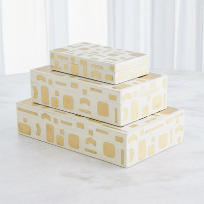 Brass Jali Box by Global Views. Made from mdf, resin, brass in a modern style.