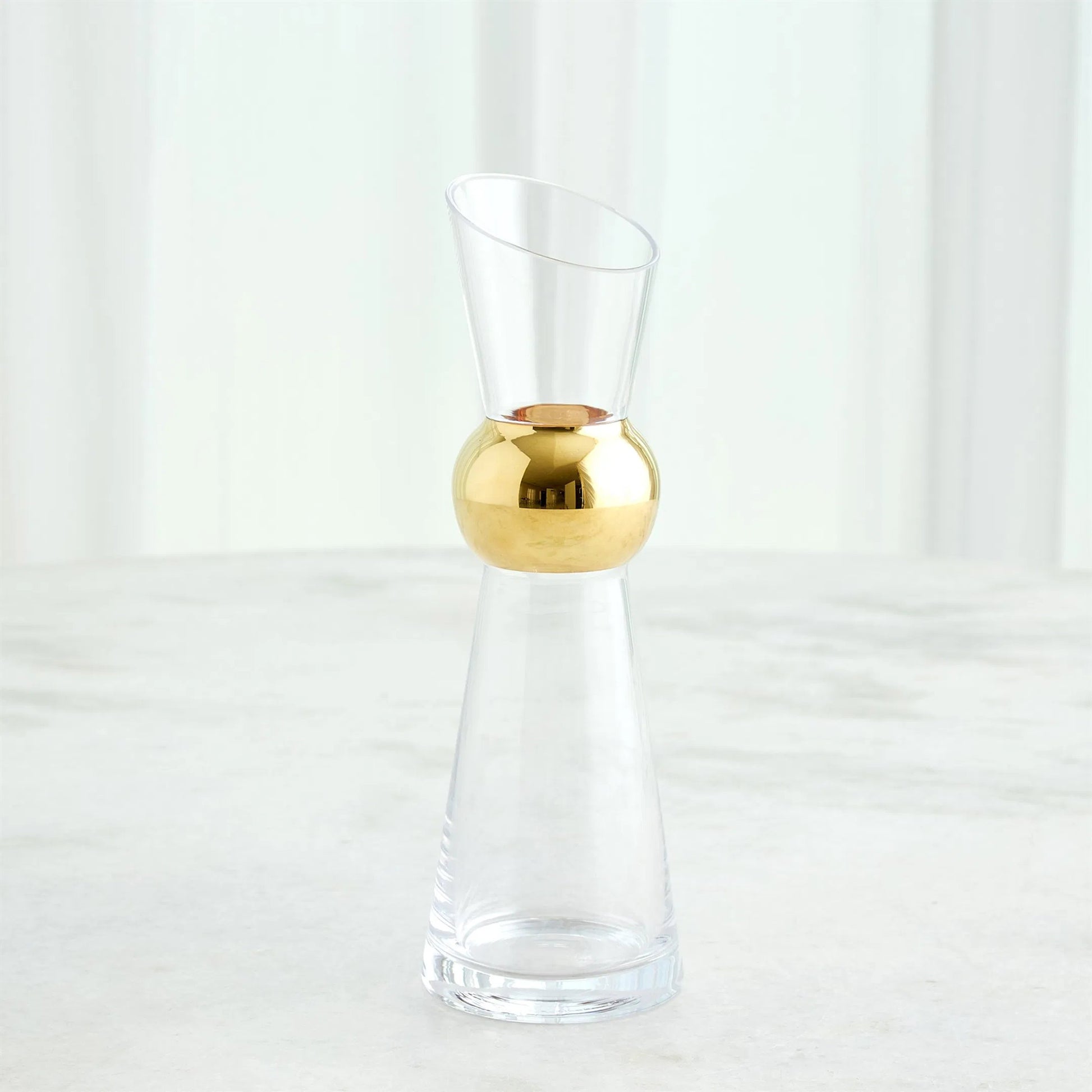 Metallic Orb Carafe by Global Views. Made from art glass in a eclectic & global style.