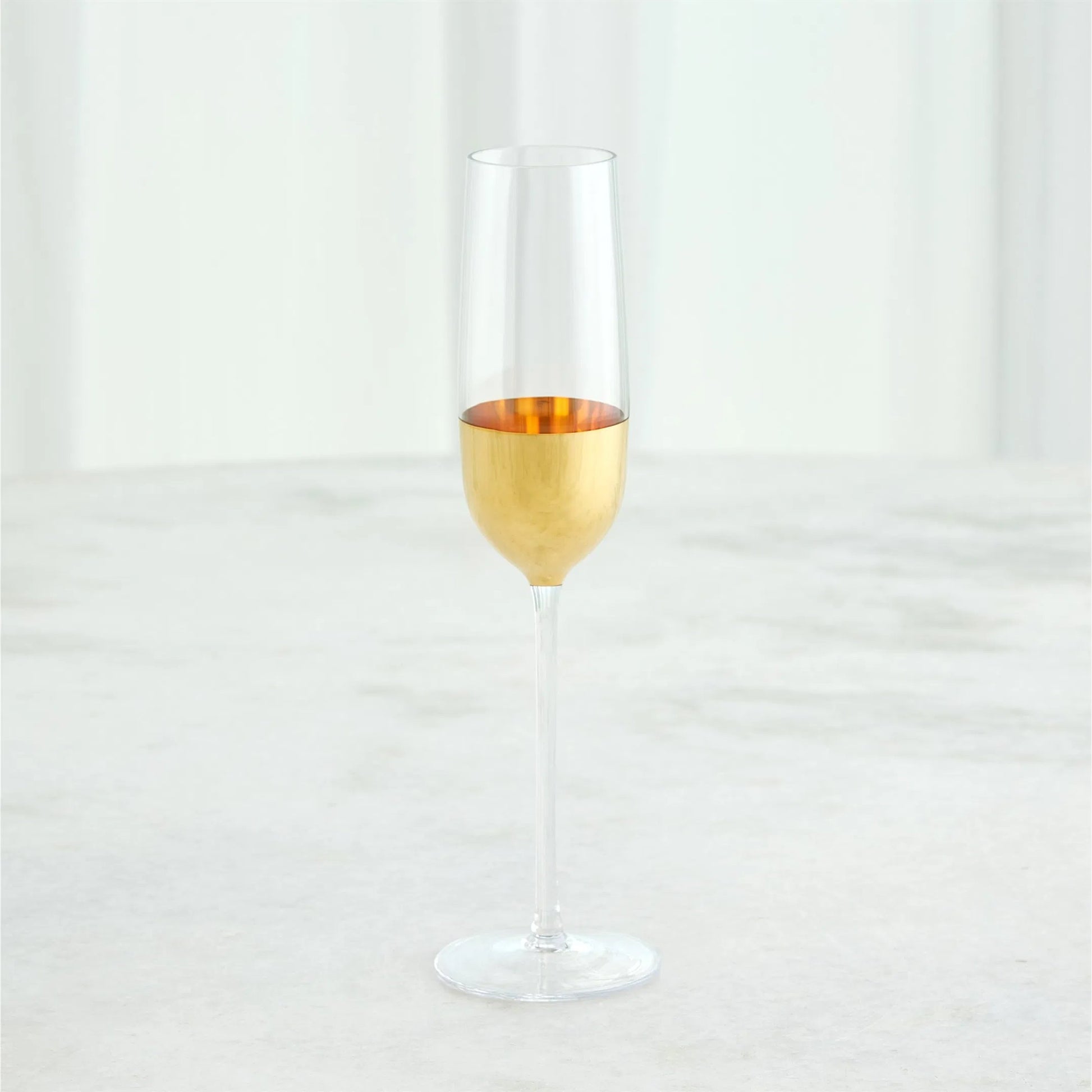 Metallic Orb Champagne Flute by Global Views. Made from art glass in a eclectic & global style.