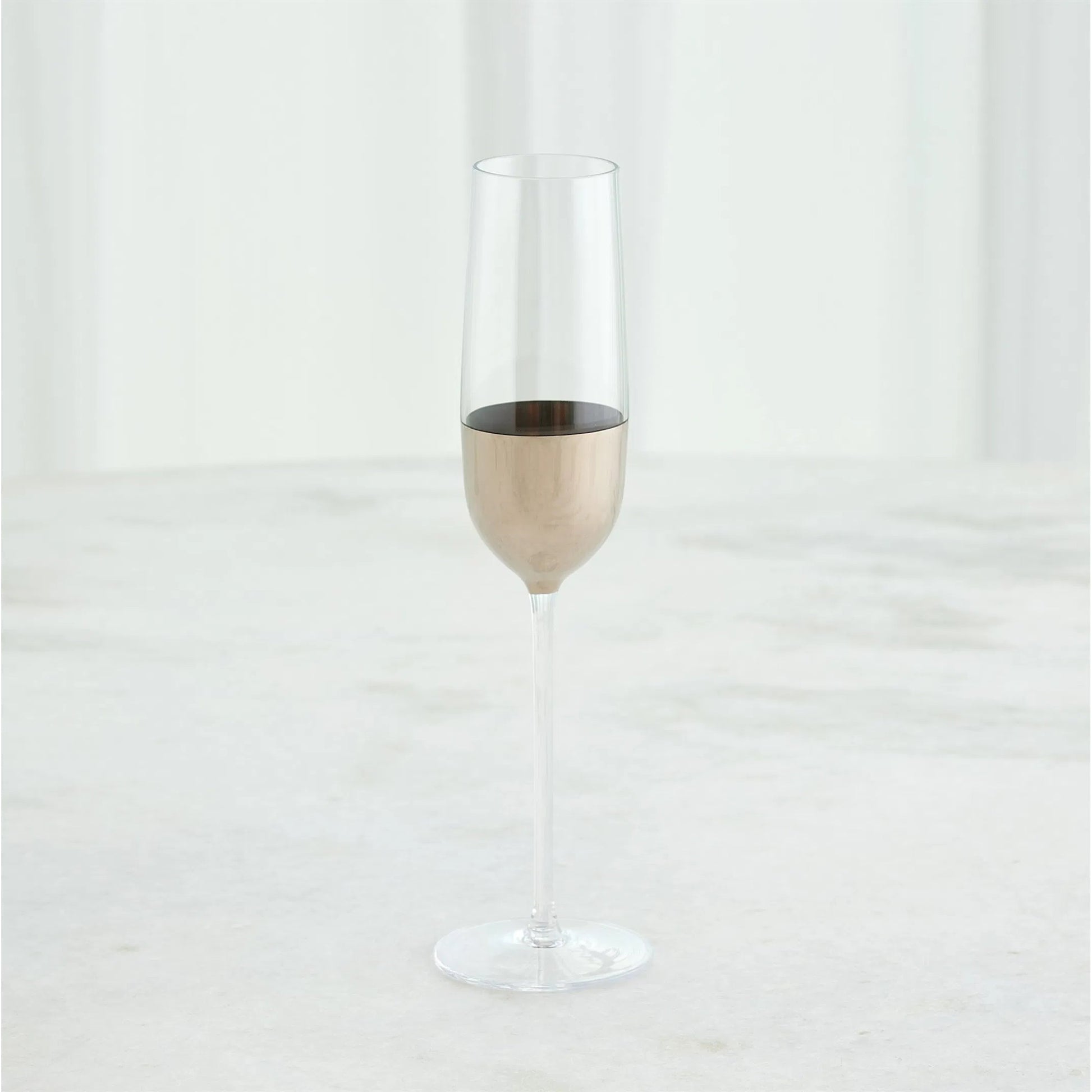 Metallic Orb Champagne Flute by Global Views. Made from art glass in a eclectic & global style.