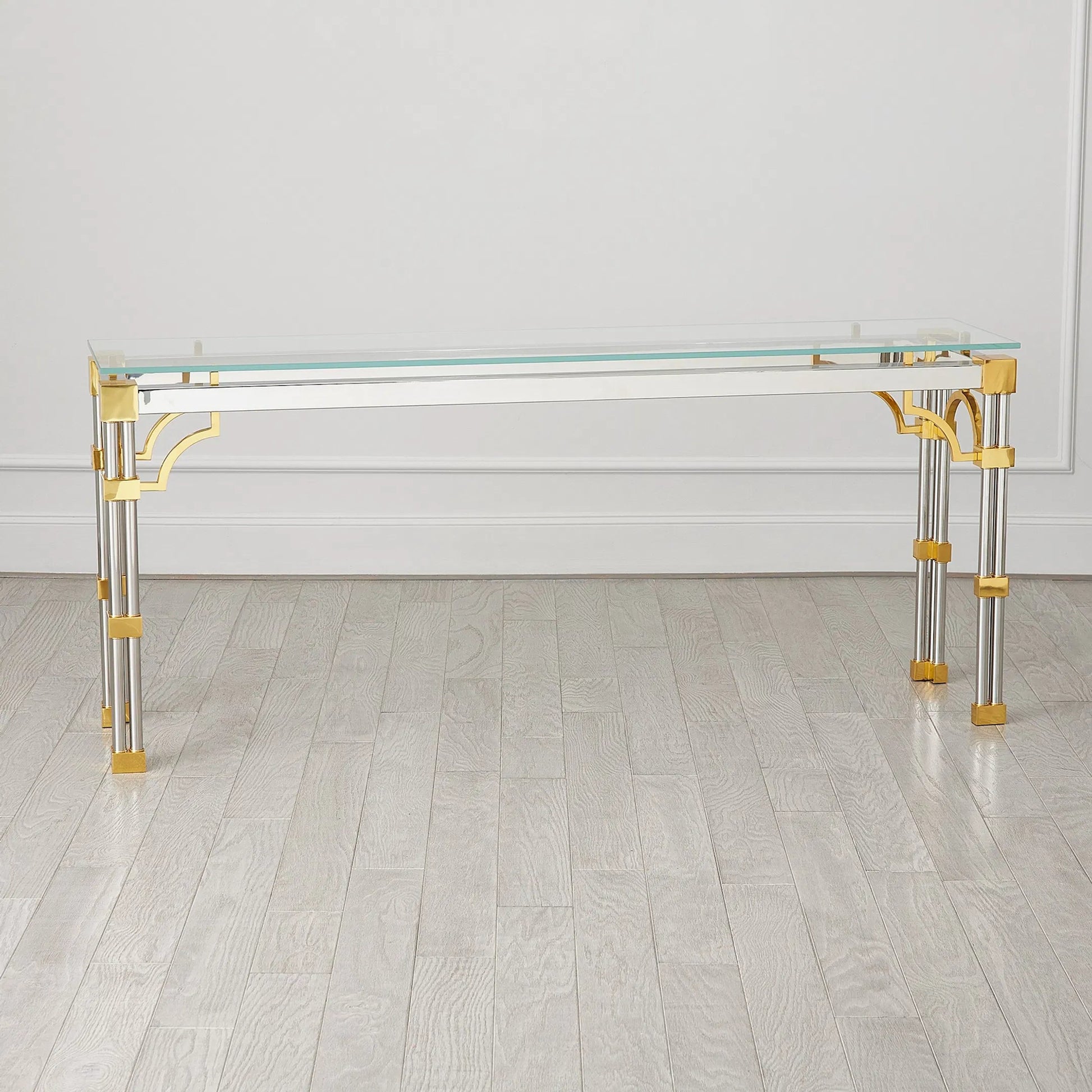 Tri-Column Console by Global Views in column console table. Made from brass, stainless steel in a modern style.