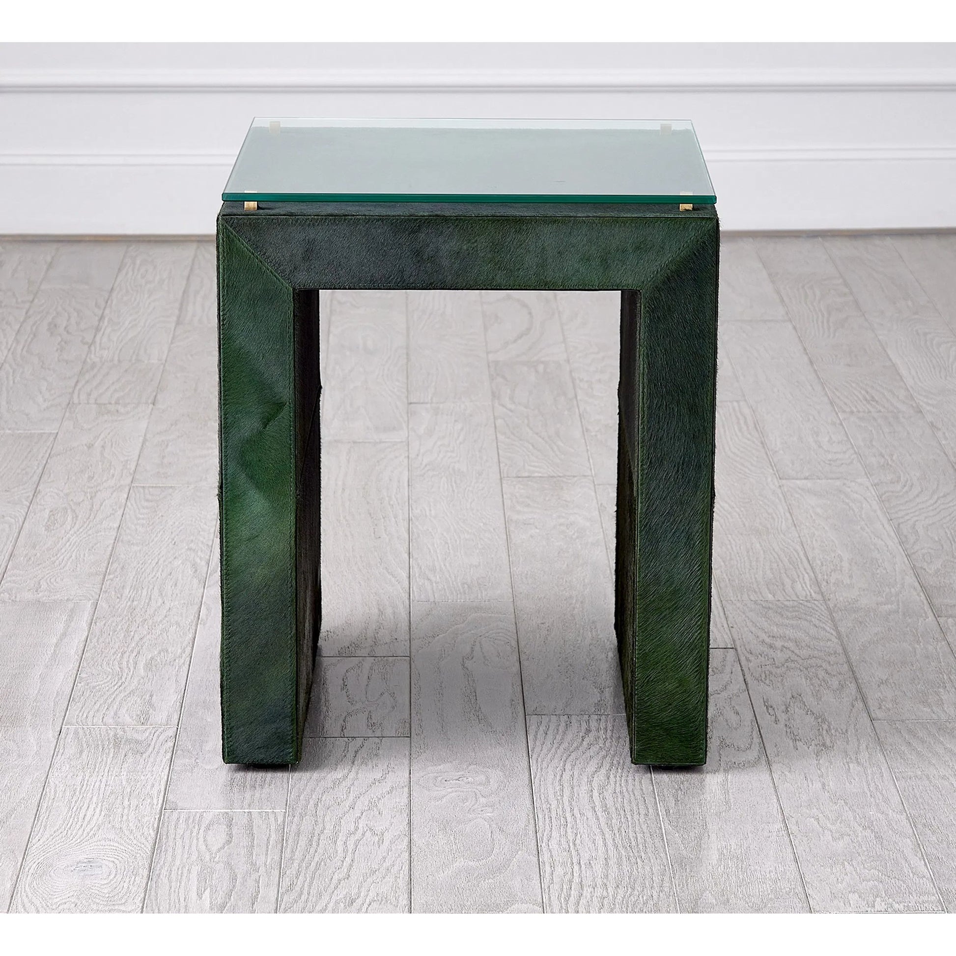 Posh Side Table by Global Views in hair. Made from mdf, hair on leather, brass, tempered glass in a unique style.