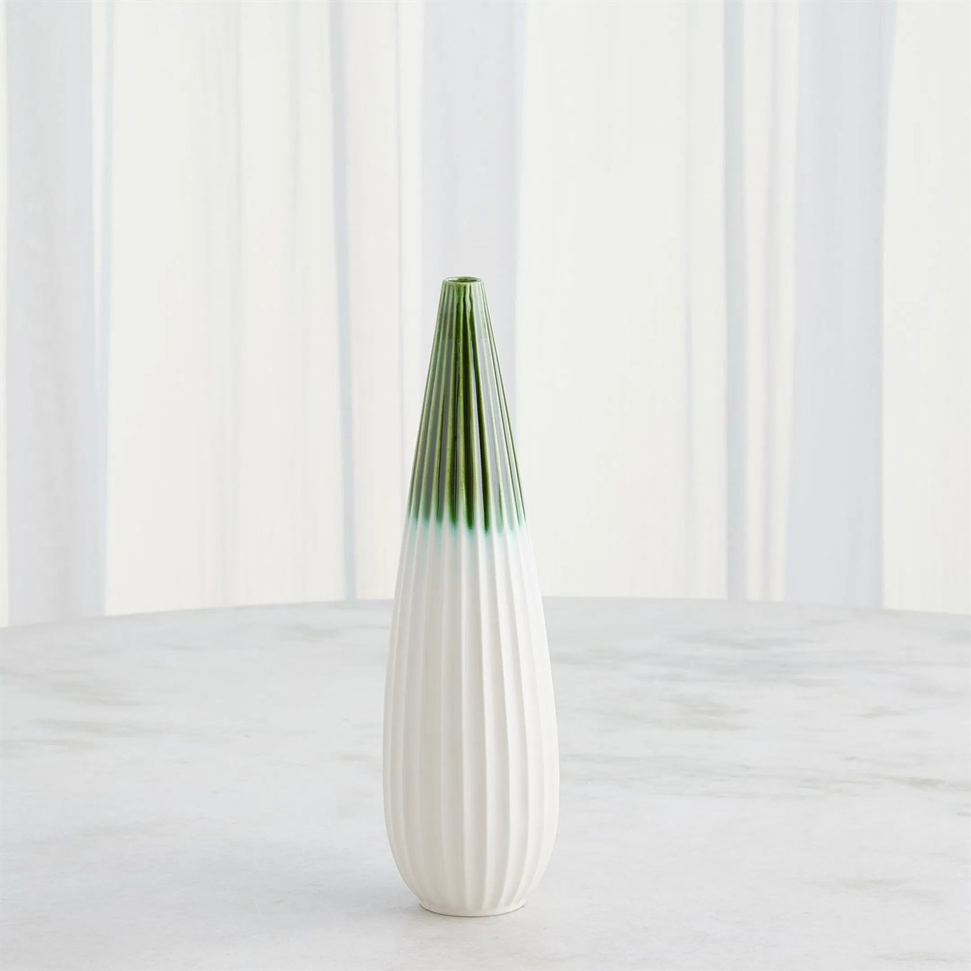 Furrow Taper Vase by Global Views. Made from ceramic in a modern style.