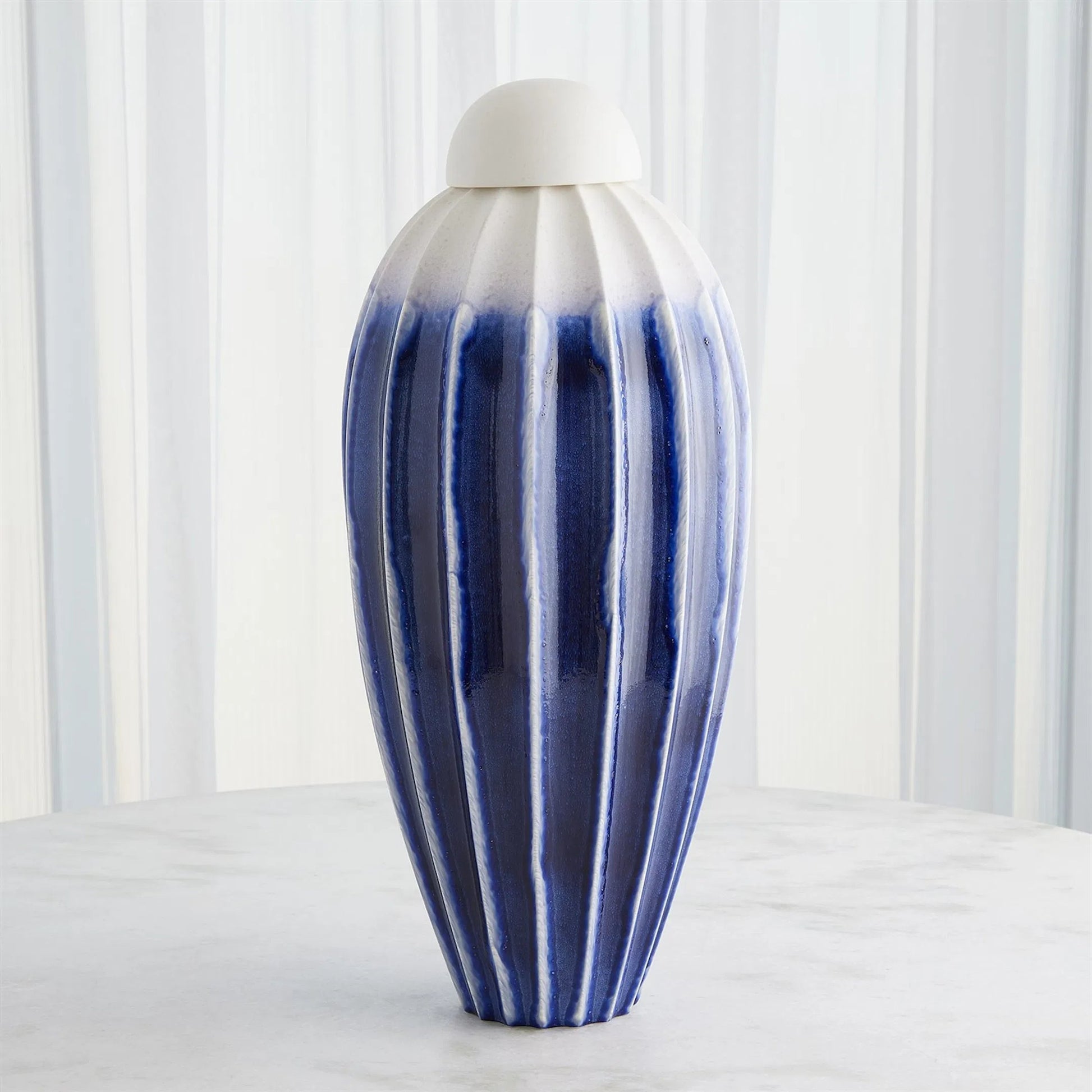 Fluted Jar with Lid by Global Views. Made from ceramic in a eclectic & global style.