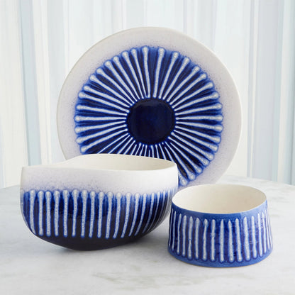 Striped Charger by Global Views in cobalt. Made from ceramic in a eclectic & global style.