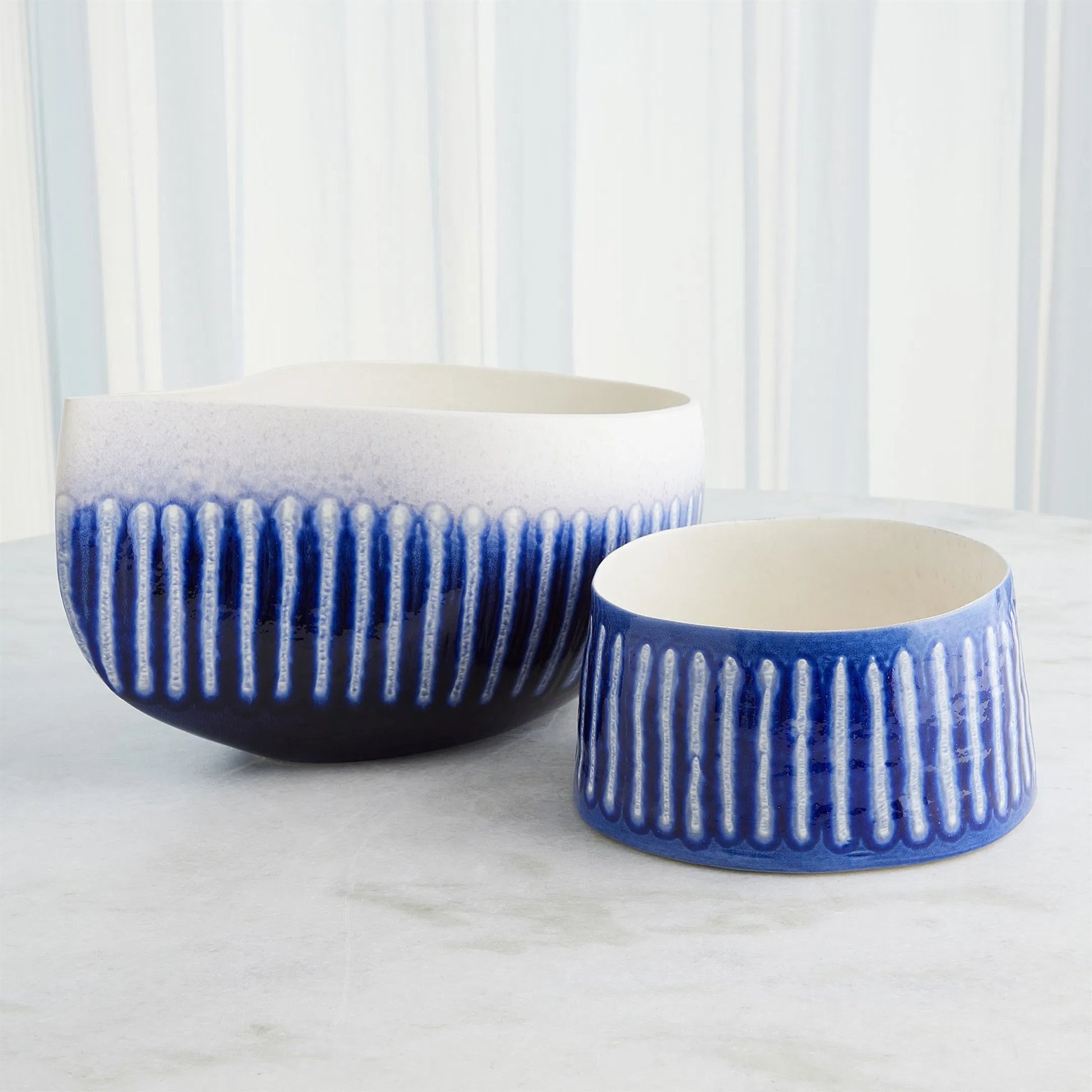 Giant Teardrop Bowl by Global Views. Made from ceramic in a unique style.