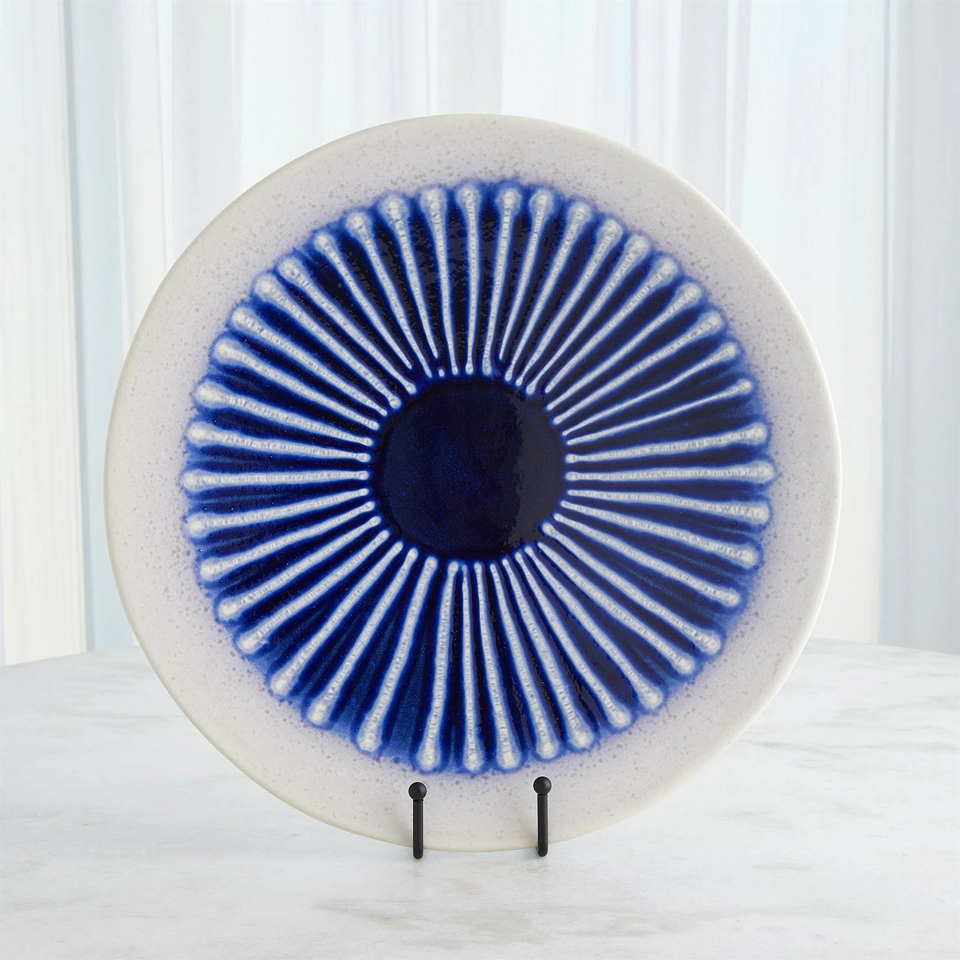 Striped Charger by Global Views in cobalt. Made from ceramic in a eclectic & global style.