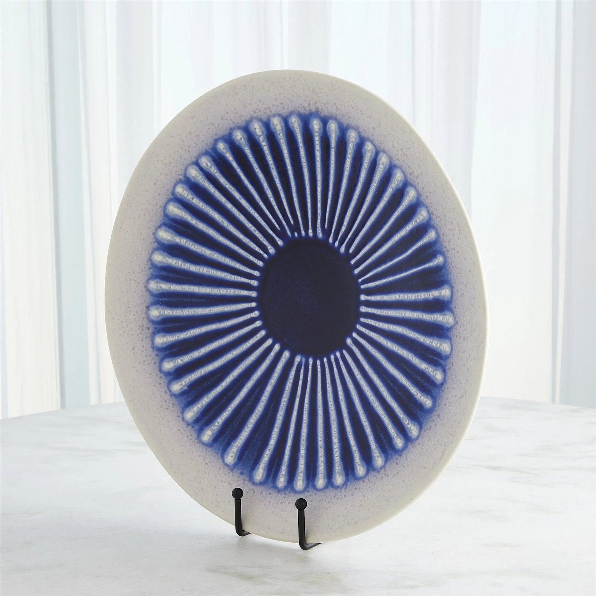 Striped Charger by Global Views in cobalt. Made from ceramic in a eclectic & global style.
