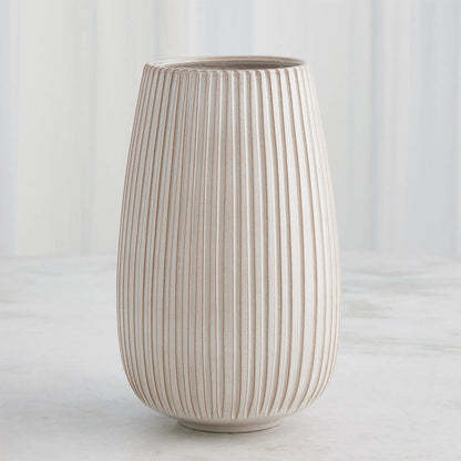 Vertical Ribbed Vase by Global Views in natural. Made from ceramic in a unique style.