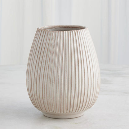 Vertical Ribbed Vase by Global Views in natural. Made from ceramic in a unique style.