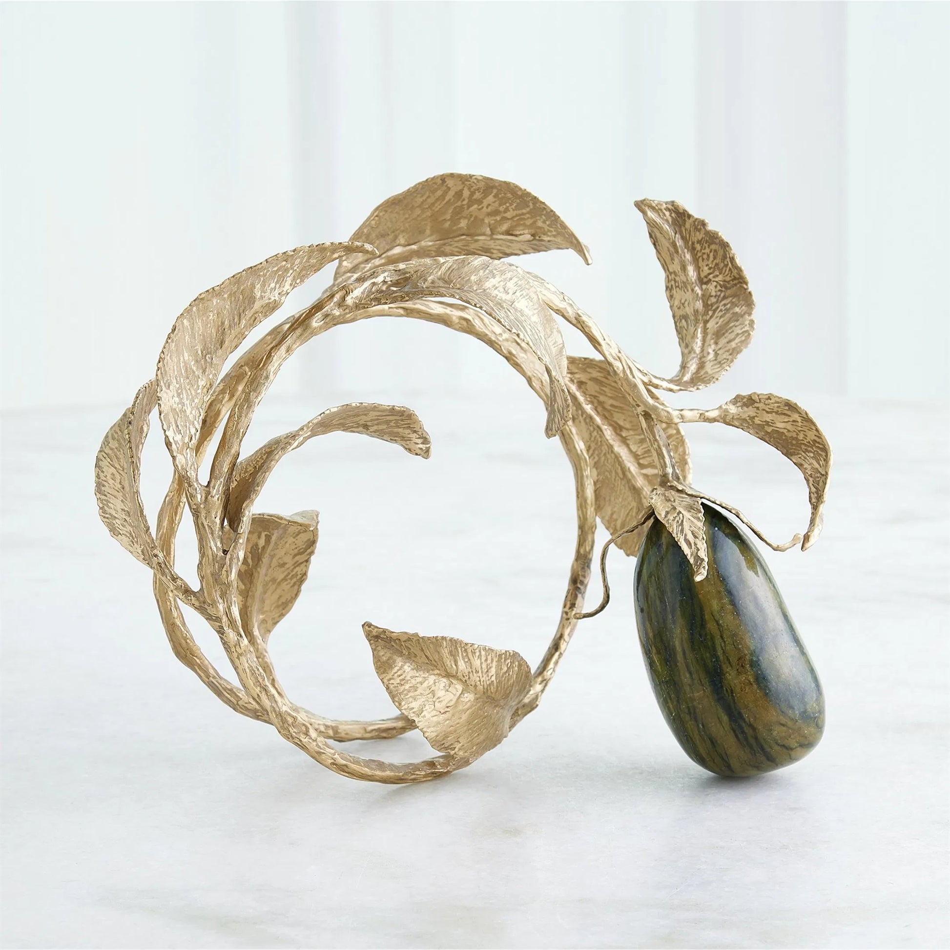 Stone Fruit Sculpture by Global Views. Made from unique in a modern style.