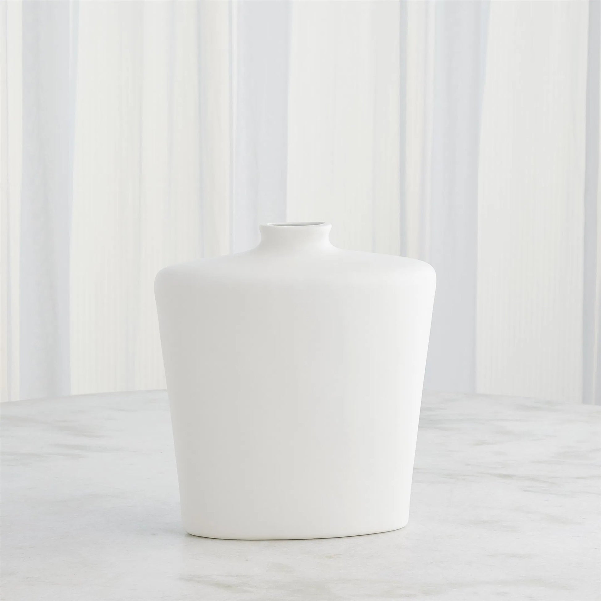 Terzo Vase by Global Views in matte white. Made from unique in a modern style.