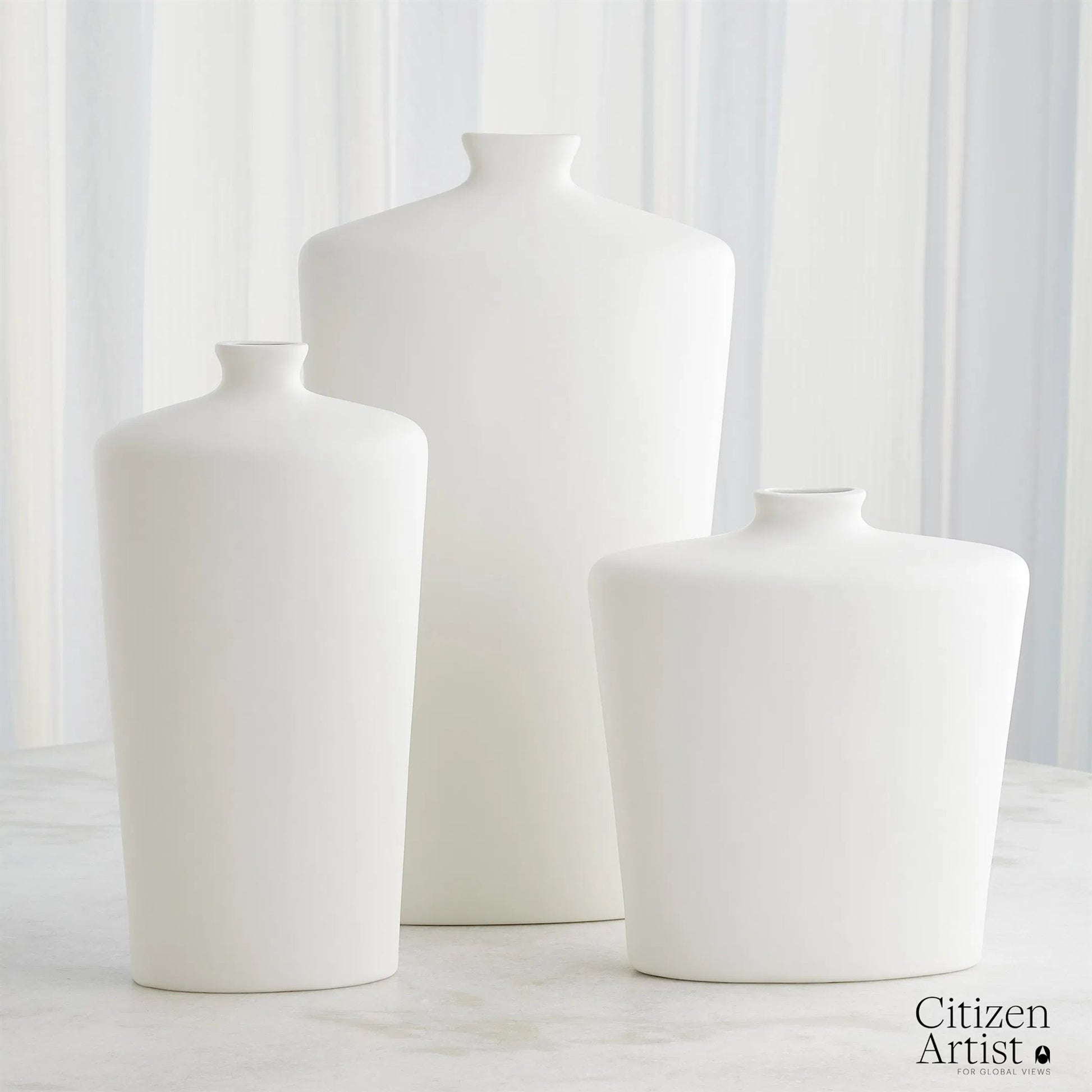 Terzo Vase by Global Views in matte white. Made from unique in a modern style.