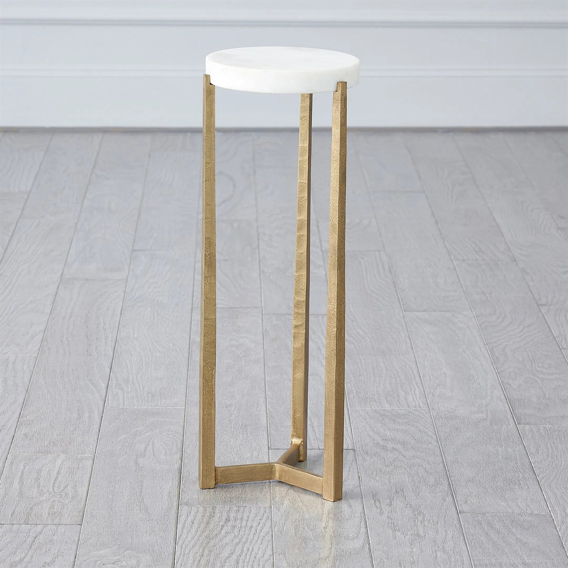 Marble Disk Table by Global Views in gold and marble. Made from unique in a modern style.
