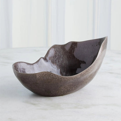 Horn Bowl, Reactive Amethyst by Global Views in reactive amethyst. Made from ceramic in a modern style.
