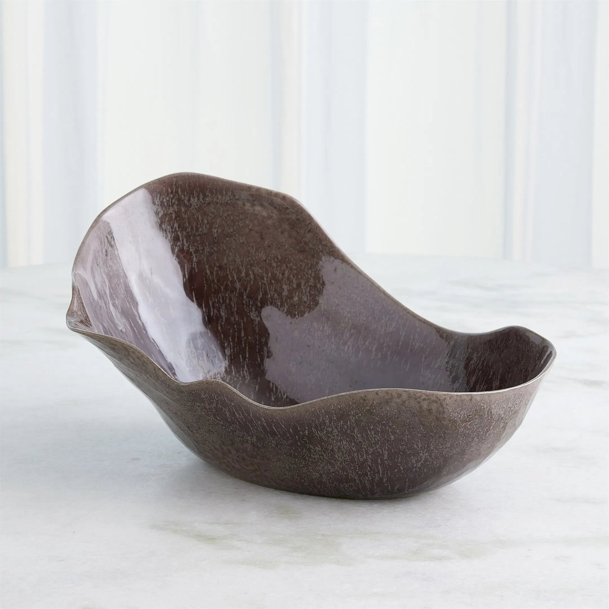 Horn Bowl, Reactive Amethyst by Global Views in reactive amethyst. Made from ceramic in a modern style.