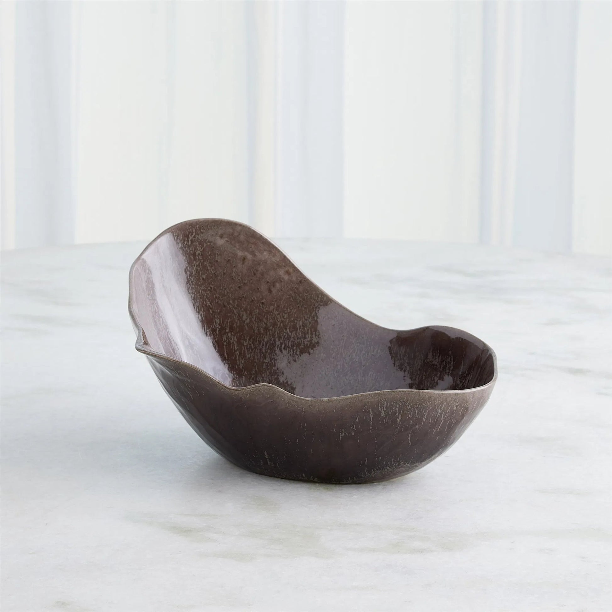 Horn Bowl, Reactive Amethyst by Global Views in reactive amethyst. Made from ceramic in a modern style.