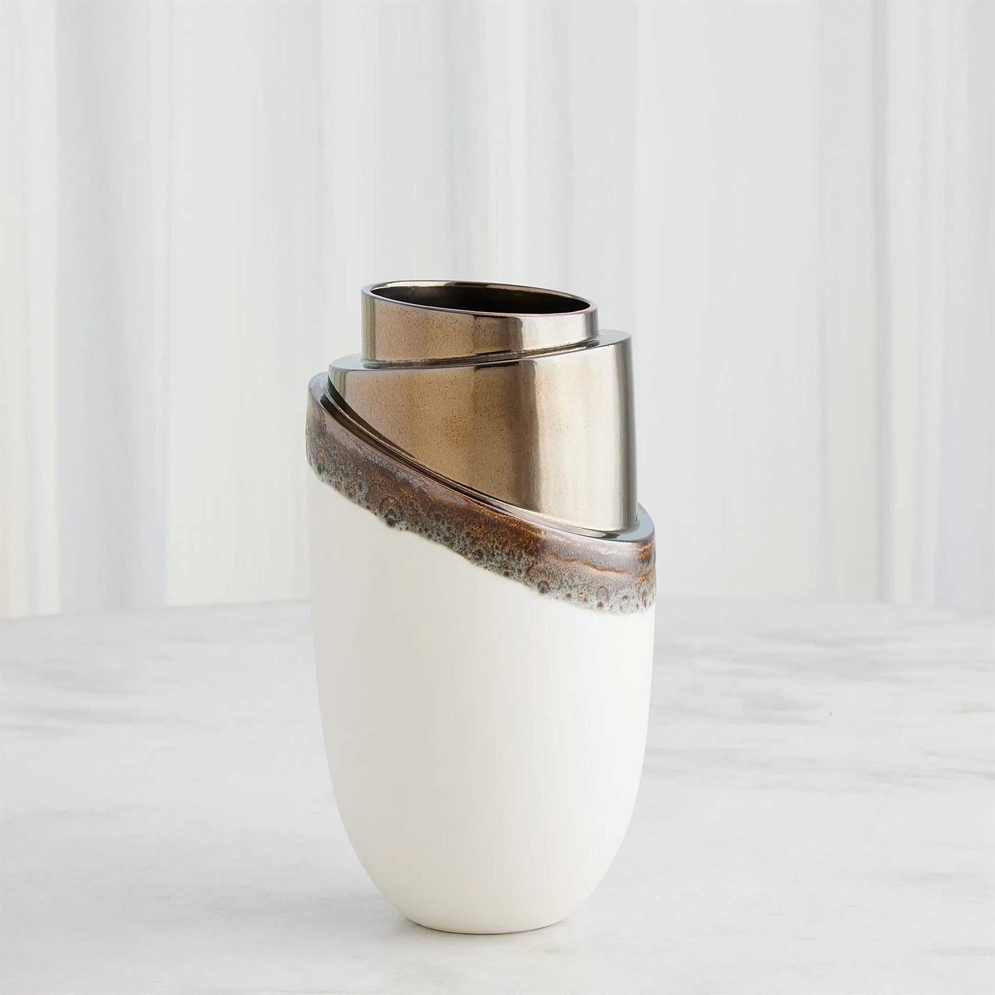 Slant Stack Vase by Global Views in reactive bronze. Made from earthenware (ceramic) in a modern style.