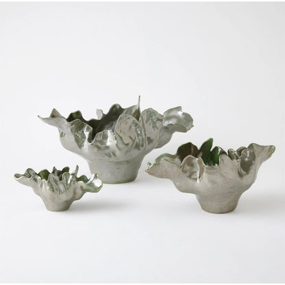 Meteor Bowl by Global Views. Made from ceramic in a coastal style.