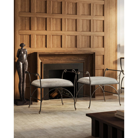 Mabel Ottoman by Currey and Company in antique black, polished brass. Made from steel, stainless steel in a transitional style.