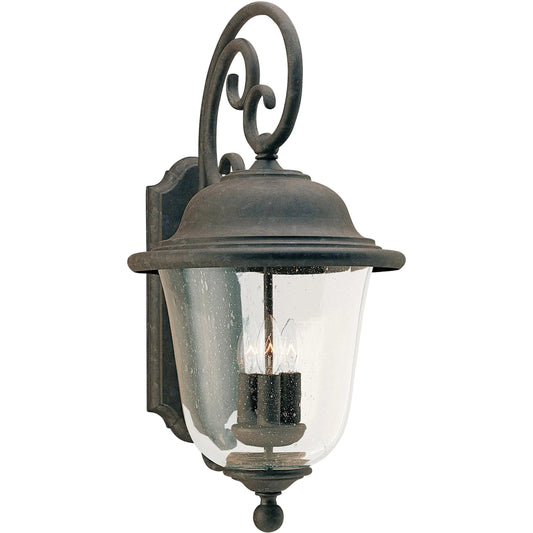 Trafalgar 3-Light Outdoor Wall Lantern by Visual Comfort & Co. in oxidized bronze. Made from aluminum in a unique style.