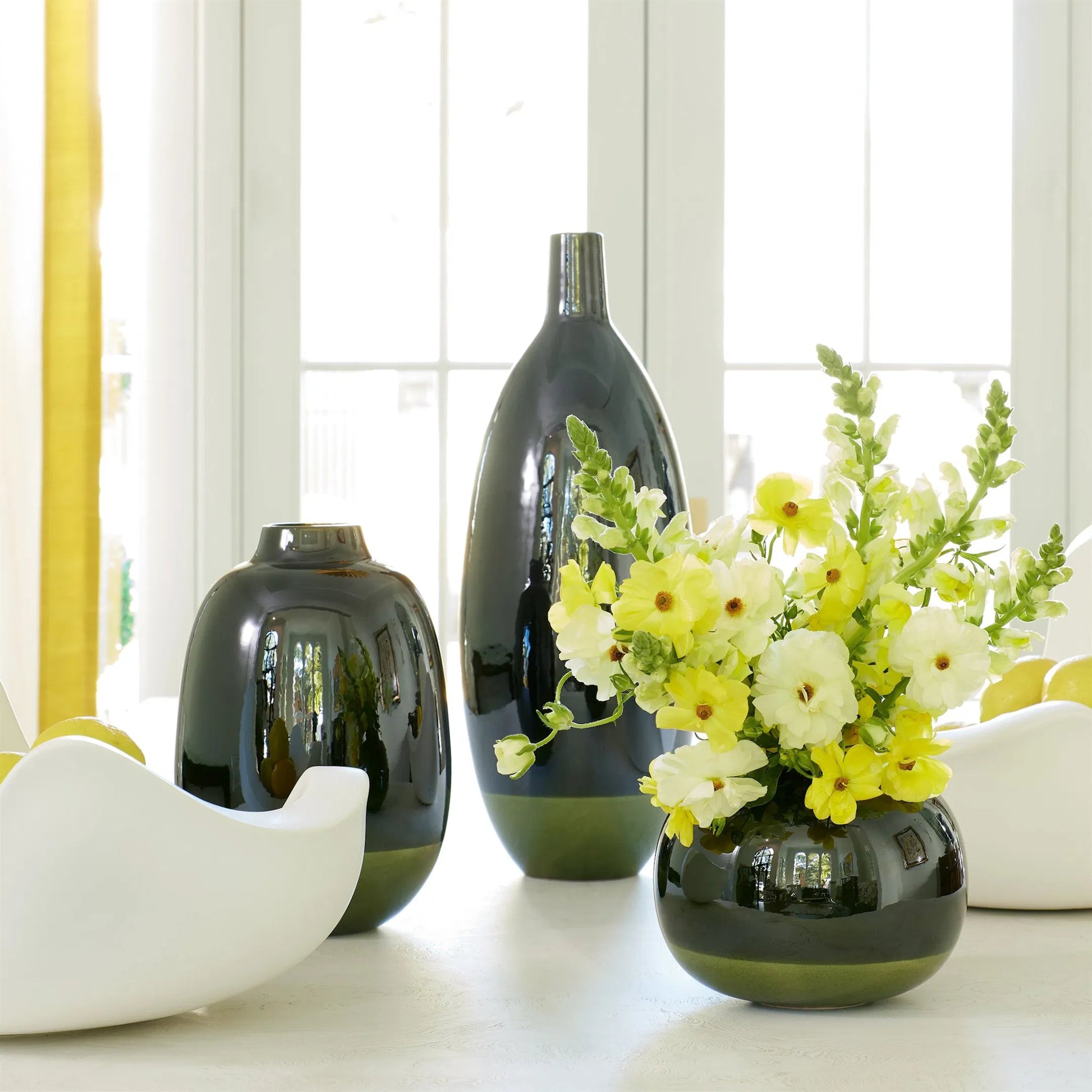 Tidal Vase by Global Views. Made from earthenware in a transitional style.