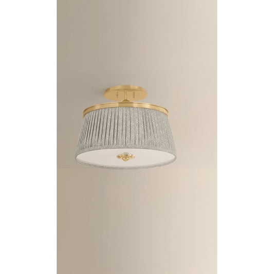 Valeria Semi Flush by Hudson Valley in aged brass. Made from linen in a unique style.
