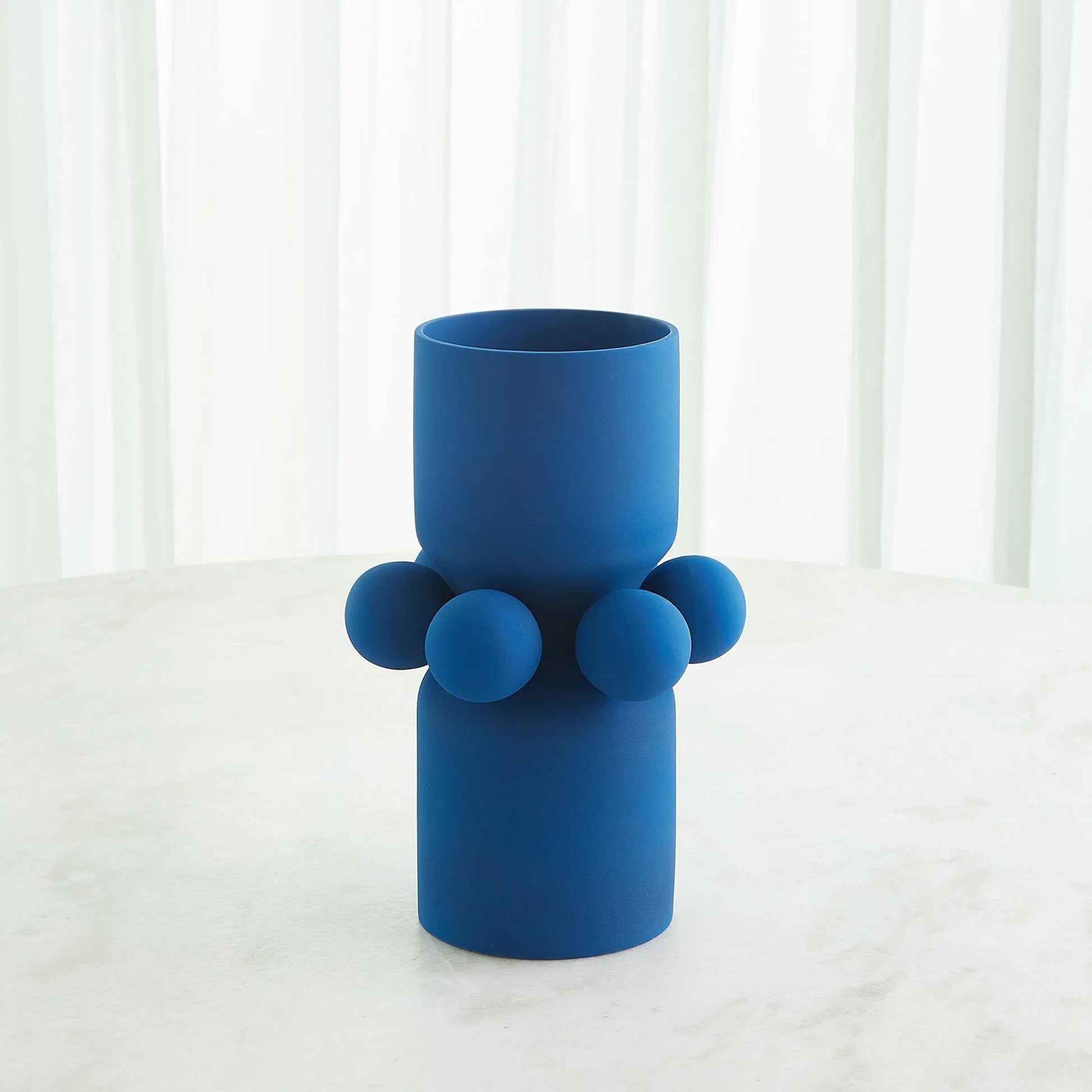 Hera Vase by Global Views. Made from ceramic in a eclectic & global style.