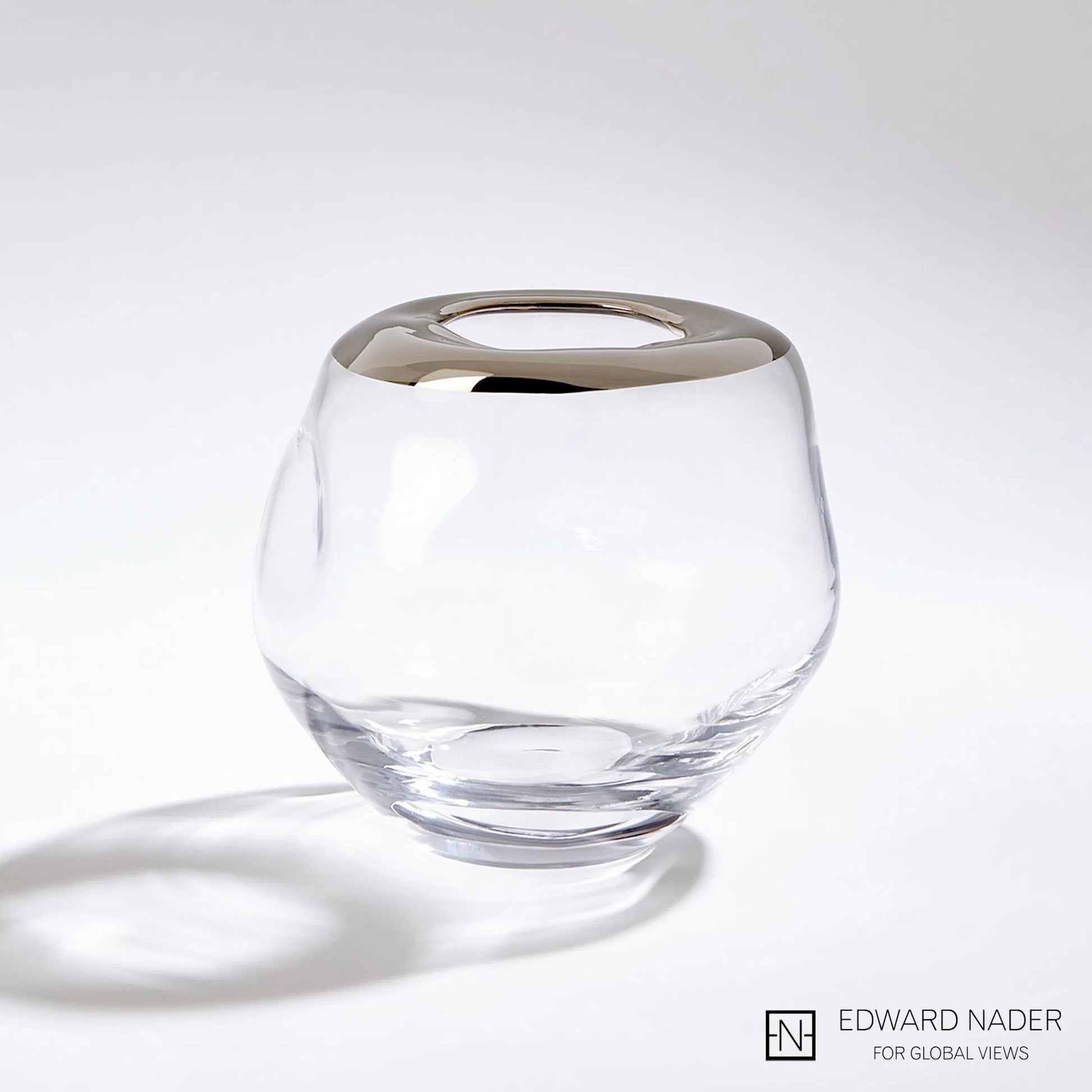 Organic Formed Vase by Global Views. Made from unique in a eclectic & global style.