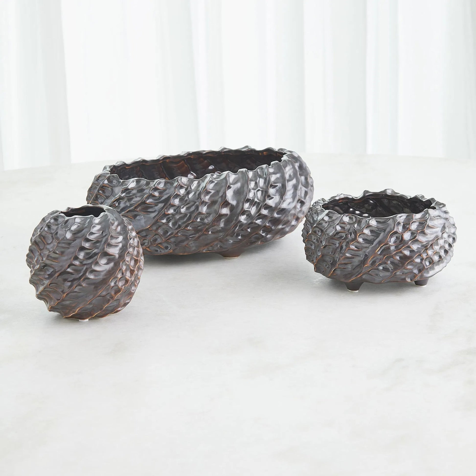 Cadoret Bowl by Global Views. Made from ceramic in a unique style.