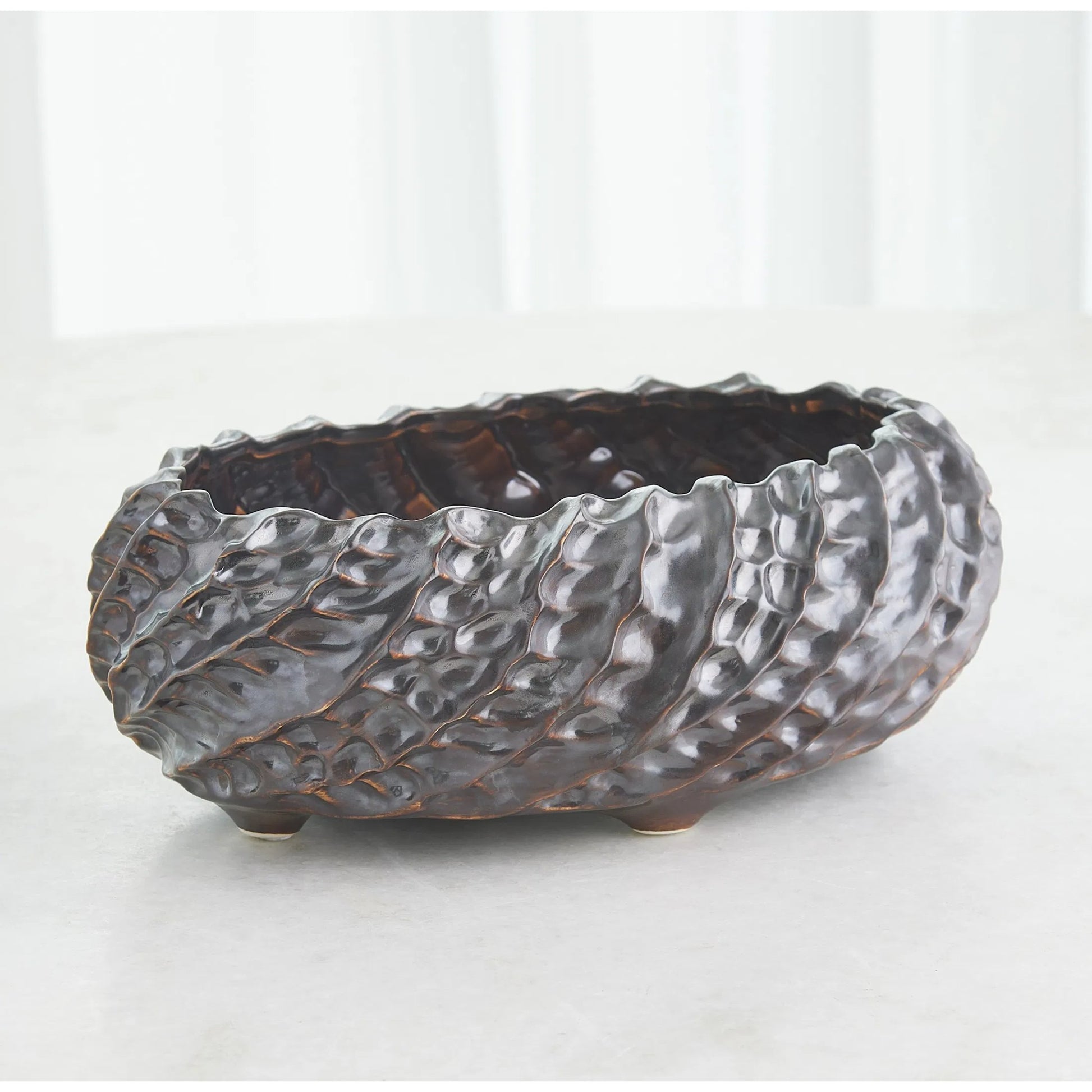 Cadoret Bowl by Global Views. Made from ceramic in a unique style.