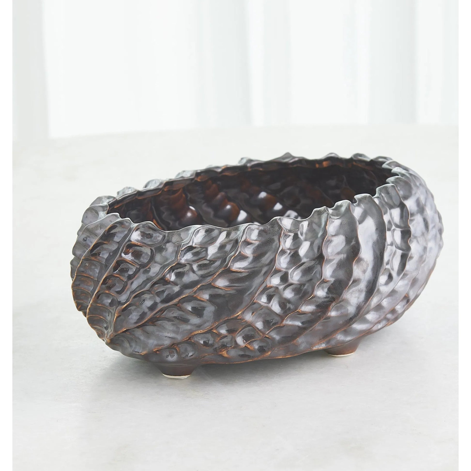 Cadoret Bowl by Global Views. Made from ceramic in a unique style.