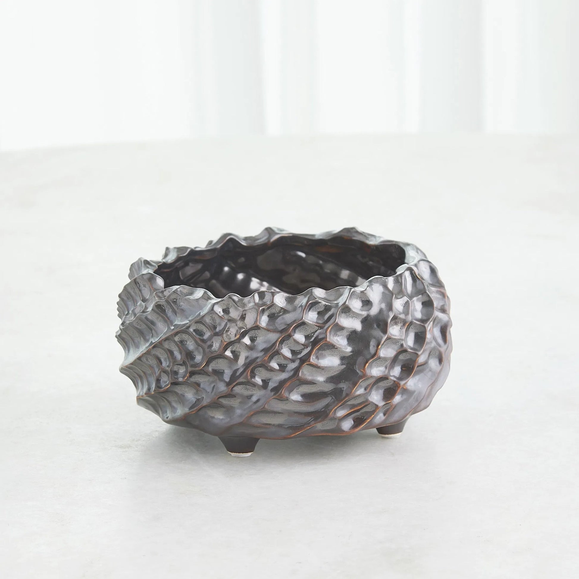 Cadoret Bowl by Global Views. Made from ceramic in a unique style.